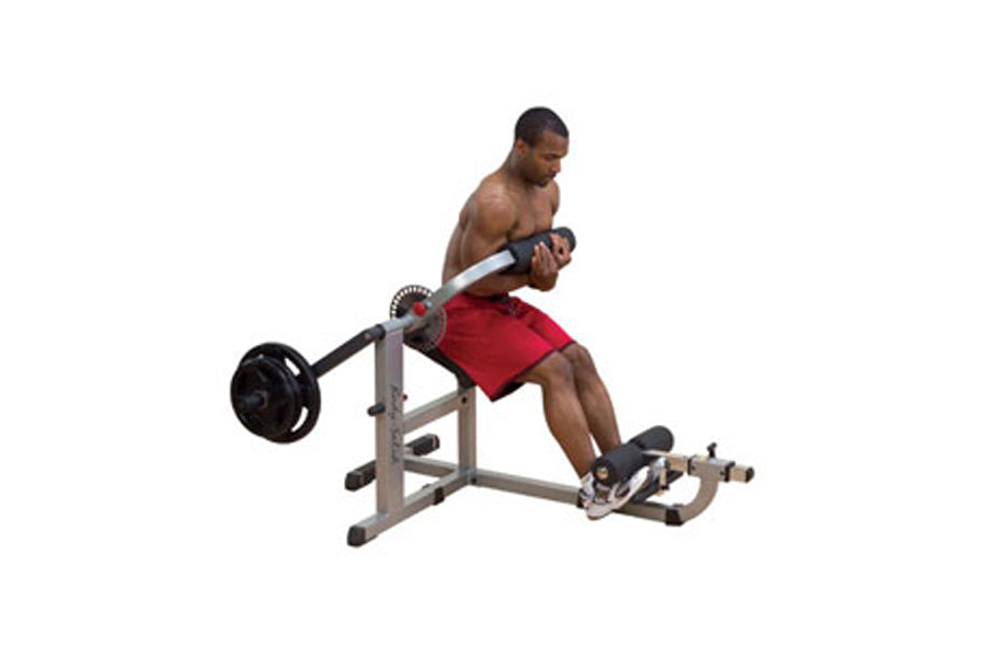 Body-Solid Ab & Back Machine with gray frame, black weight plate, and red seat pad, shown in use by male model on white backg