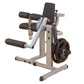 Beige and black leg extension and curl machine with padded black seat, footrest, and weight plate attachment on white backgro