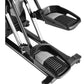 Black and silver elliptical trainer with dual foot pedals and upper body handles, shown at angle on white background