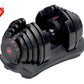 Pair of black Bowflex SelectTech adjustable dumbbells with red accents on weight selector dial, resting in black base stand
