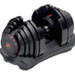 Pair of black adjustable dumbbells with red text markings on weight selector dial, shown in standing position on black base