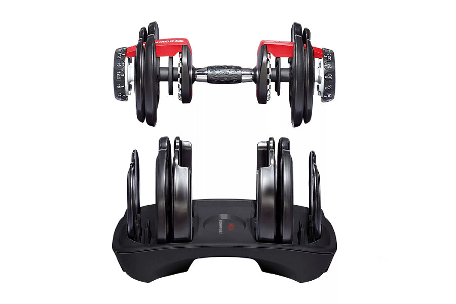 Bowflex SelectTech adjustable dumbbells with red and black weight plates, shown individually and in black stand on white back