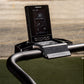 Woodway Curve LTG treadmill with digital console mounted on curved black handlebar, displayed on green mat