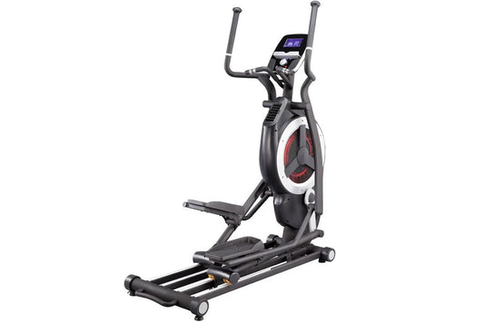 Black elliptical trainer with digital console, red accents, and extended handlebars on white background