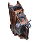 Folding water rowing machine with brown wood frame, black footrest straps, and transparent water resistance chamber on white 