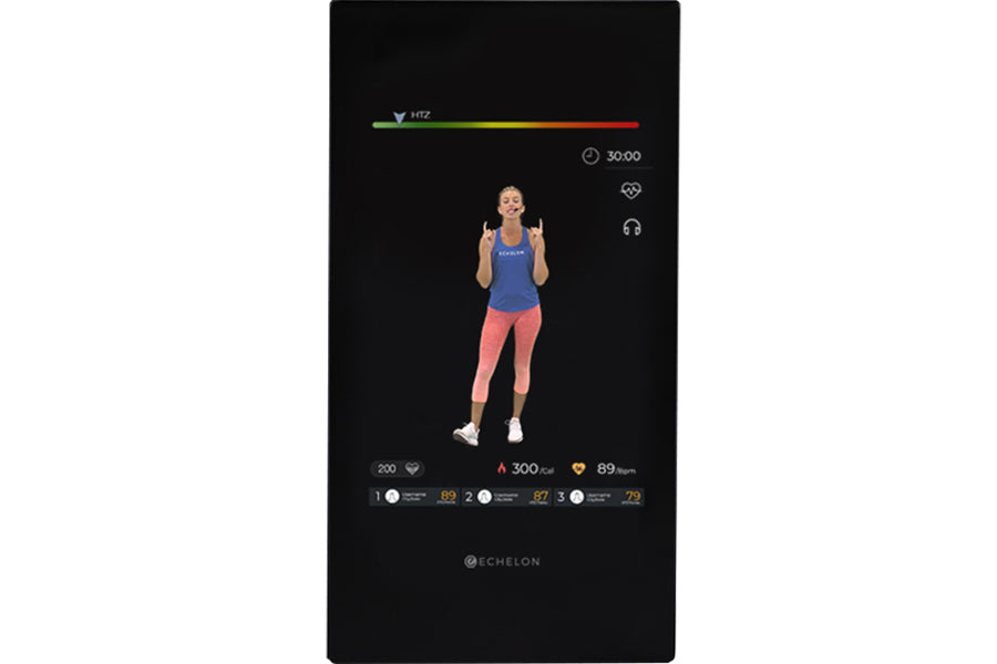 Echelon Reflect 40 smart fitness mirror displaying workout class with female instructor in blue tank top and coral leggings o