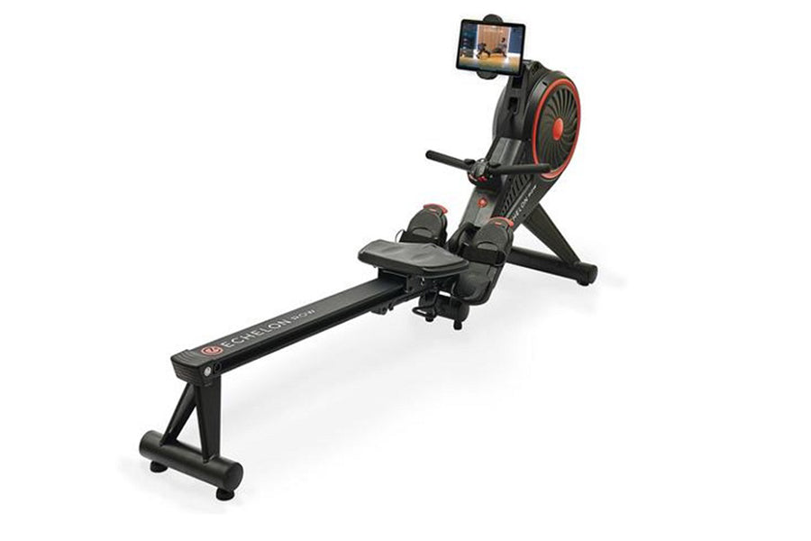 Black and gray rowing machine with red accents, tablet holder mounted on flywheel, and padded seat on slide rail