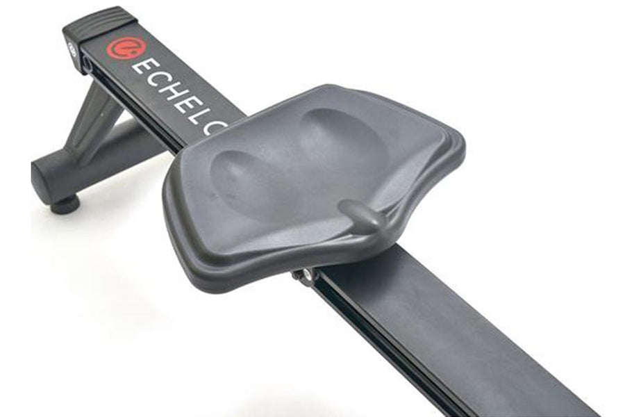 Black Echelon rowing machine footplate and handle grip with branded strap, on white background