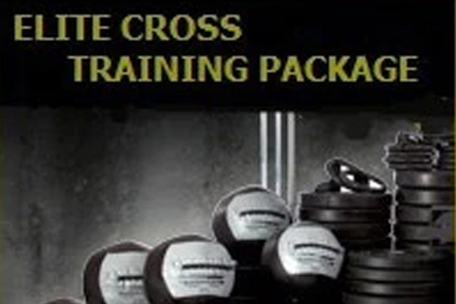 Warrior Elite Cross Training W.O.D. Package with medicine balls and stacked weight plates on dark background