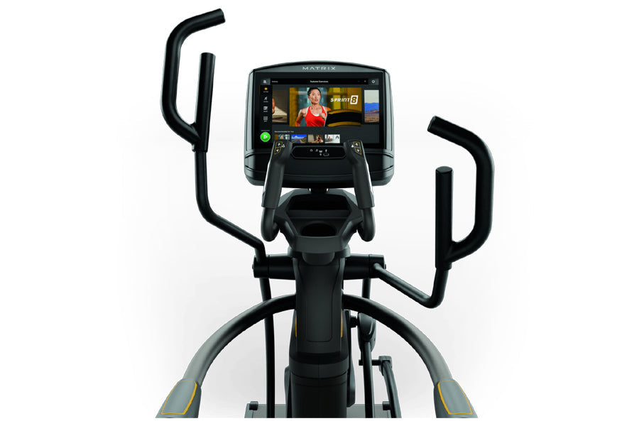 Matrix A50 Ascent Trainer elliptical with digital touchscreen display and black handlebars on white background