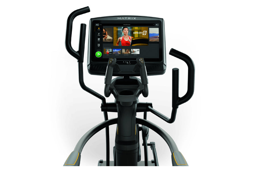 Matrix A50 Ascent Trainer with black frame, dual handles, and touchscreen display showing workout content, front view on whit
