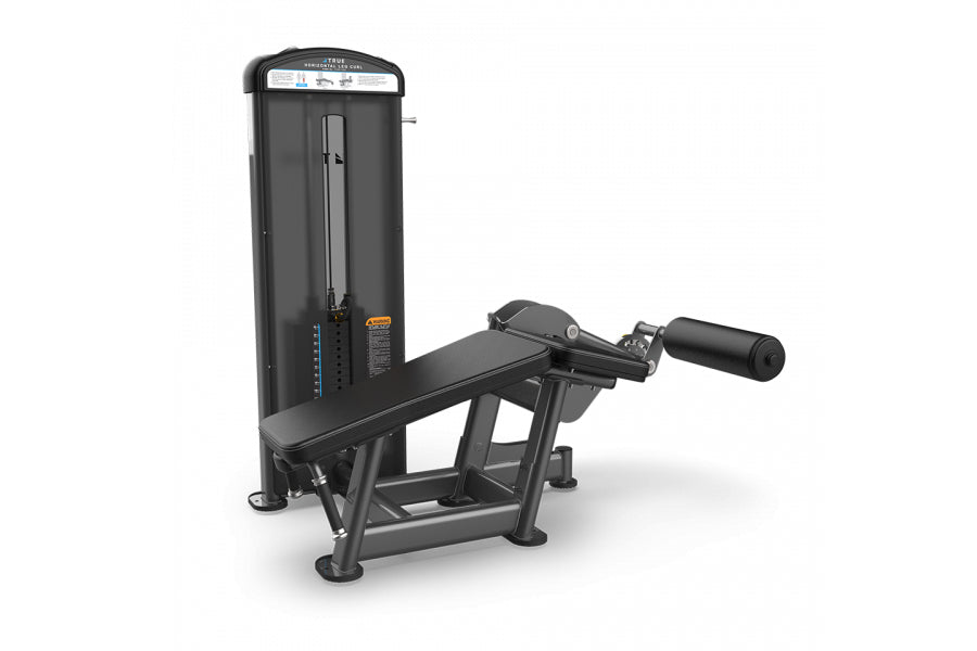 Black leg curl exercise machine with padded seat and footrest, featuring tall vertical weight stack and control panel on whit