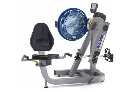 FluidRower E-720 Cycle-XT MDD upper body ergometer with gray frame, black padded seat, blue fluid resistance dial, and digita