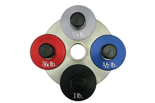 Warrior Fractional Add-On Plates in gray, red, blue, and black with weight labels 1/4lb, 3/4lb, 1/2lb, and 1lb, displayed on 