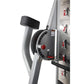 Freemotion Genesis G624 dual cable cross machine with gray frame, black padded handles, red weight selector, and instruction 