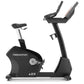Freemotion u22.9 upright exercise bike with black frame, white seat post, and dual handlebar arms on white background
