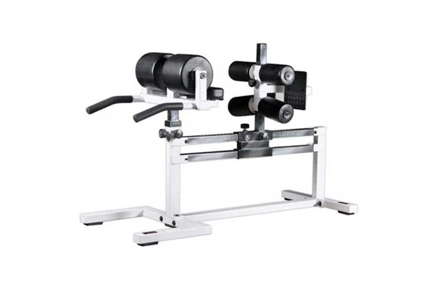 White and black leg exercise machine with padded rollers and adjustable seat on white background