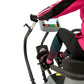 Person wearing hot pink jacket and black striped leggings using Physiostep LXT recumbent elliptical with digital display cons