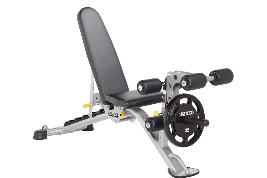Hoist weight bench with gray cushioned seat and backrest, silver metal frame, black handles, and attached black weight plate 