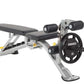 Hoist leg extension and leg curl machine with black padded seat, silver frame, black handles, and 35-pound weight plate on wh