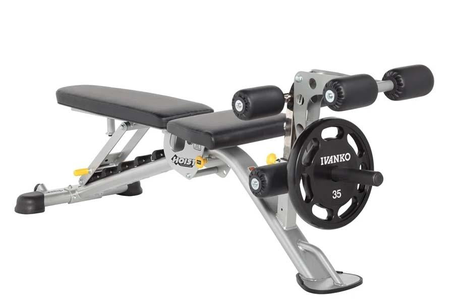 Hoist Preacher Curl Attachment with silver frame, black padded seat, dual black handle grips, and 35-pound weight plate on wh