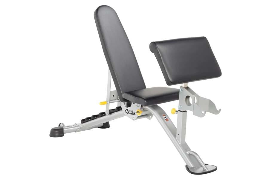 White and gray weight bench with adjustable leg extension attachment and black padded seat and back support on white backgrou
