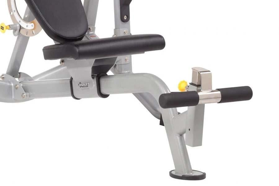 Hoist preacher curl attachment with gray frame, black padded arm rest and handles, yellow adjustment knob on white background