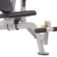 Hoist leg extension and curl machine with gray frame, black padded seat and leg pads, shown against white background