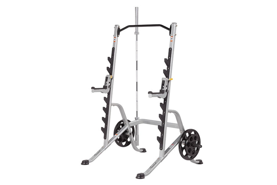 Smith machine squat rack with silver frame, black weight plate holders, and black wheels on white background