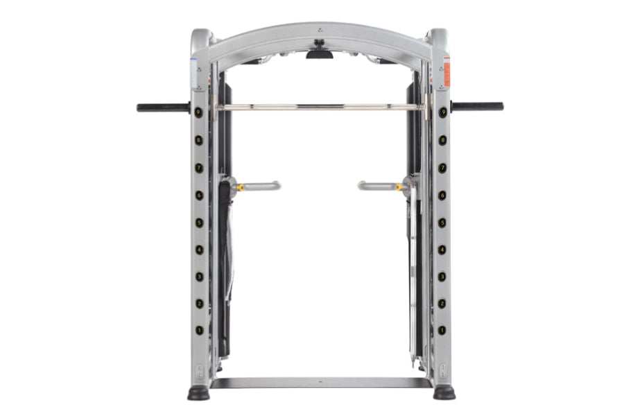 Hoist Mi7 Smith functional training system with white frame, black handles, and adjustable weight pegs, front view on white b