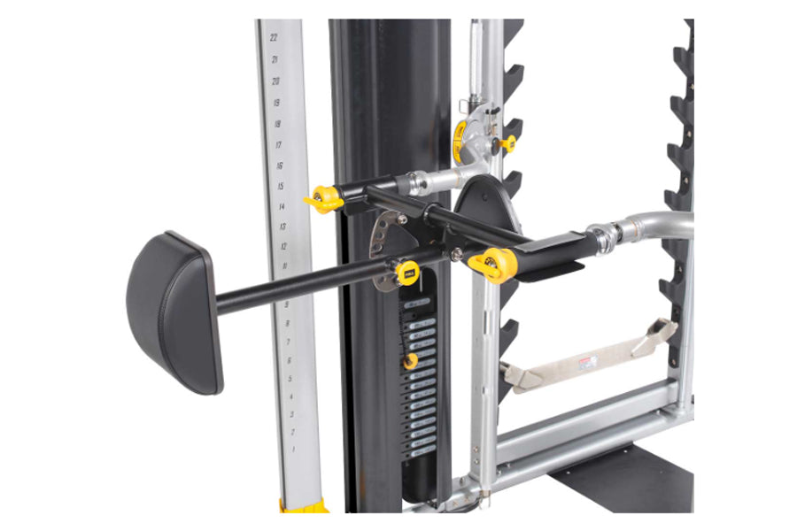 Hoist Mi7 Smith Functional Training System with black barbell, yellow connectors, and chrome safety arms on white background