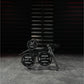 Hammer Strength ground base multi-squat machine with black weight plates and metal frame in gym setting