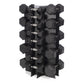 Black hexagonal dumbbell set with chrome handles on rotating stand, flat lay on white background