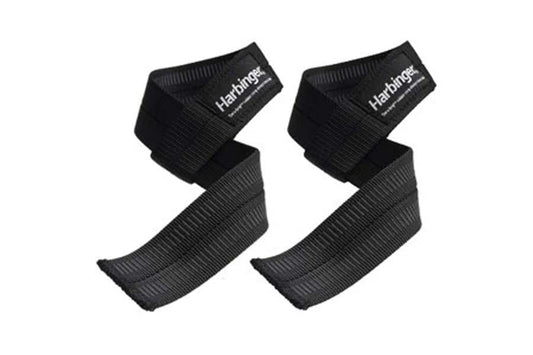 Pair of black Harbinger lifting straps with padded grip, flat lay on white background