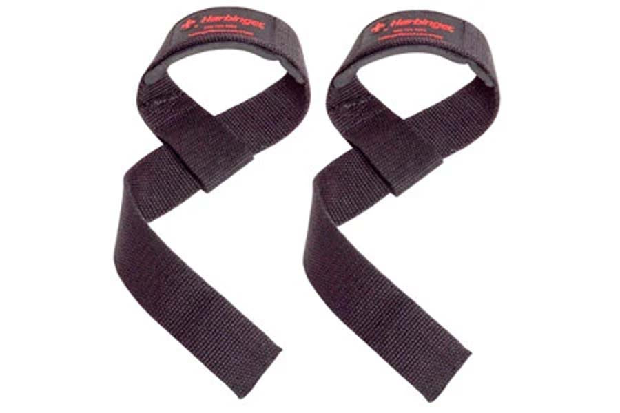 Pair of black padded cotton lifting straps with red branded labels, laid flat on white background