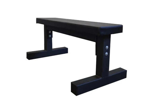 Warrior heavy duty flat bench with black padded seat and sturdy steel frame on white background