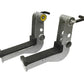 Pair of gray and black metal preacher curl attachments with yellow roller and black handles, flat lay on white background
