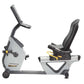 Hoist Lemond Series RT recumbent exercise bike with white frame, black handles and seat, yellow accents, on white background