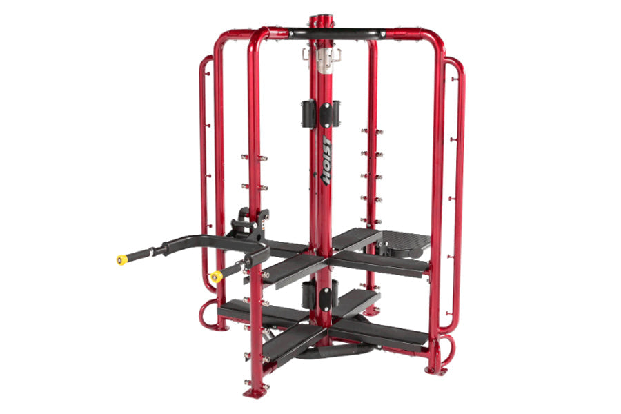 Red and black multi-station fitness cage with leg press, chest press, and lat pulldown attachments on white background