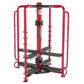 Red and black multi-station exercise machine with dual leg press platforms and cable attachment points on white background