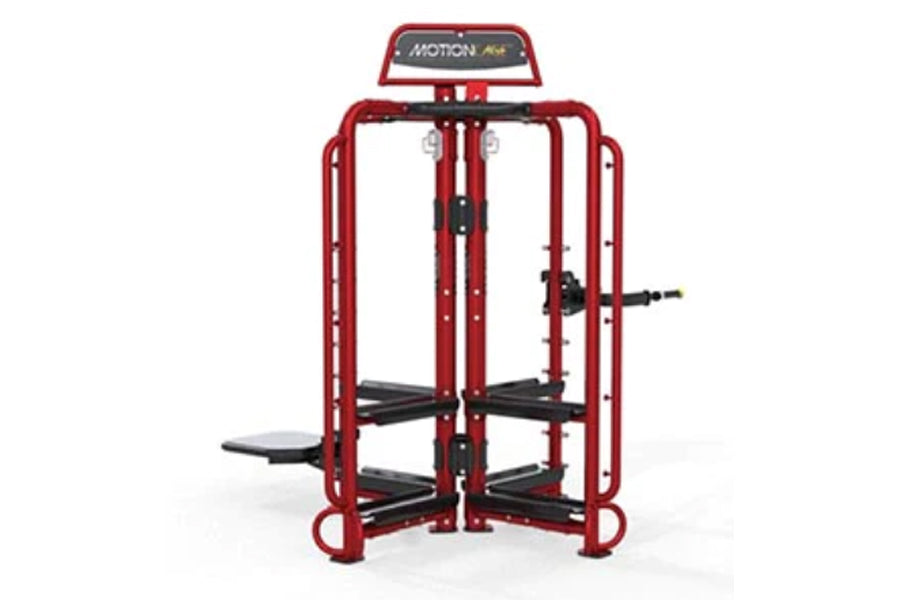 Red metal Motioncage strength training machine with black foot pedals and handles on white background