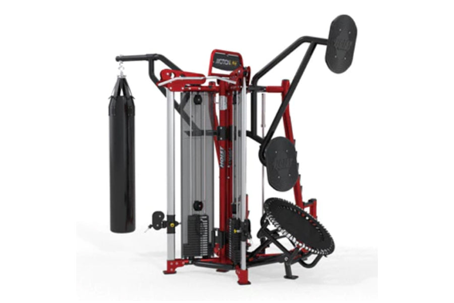 Red and black multi-station home gym equipment with punching bag, leg press, and seated exercise stations on white background