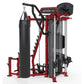 Red and black Hoist MCS-8005 Motioncage multi-station gym equipment with heavy bag, chest press, and leg press stations on wh