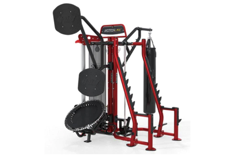 Red and black Hoist MCS-8005 Motioncage multi-station gym equipment with leg press, chest press, and rebounder on white backg