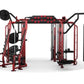 Red and black Hoist MC-7000 Series Motioncage multi-station gym equipment with punching bag attachment, shown on white backgr