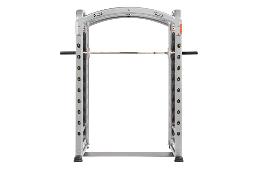 Silver and black Hoist Smith Machine with dual uprights, horizontal bar, and weight plate storage pegs on white background