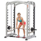 Silver and black dual action smith machine with woman demonstrating exercise in teal sports bra and pink shorts