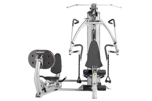 Hoist V4-Elite home gym with leg press attachment, silver frame with black seat and handles, front view on white background