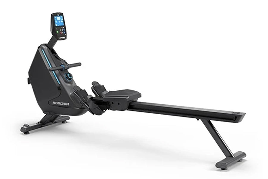 Black Horizon Oxford 6 rowing machine with digital display console, adjustable seat, and extended footrest on white backgroun