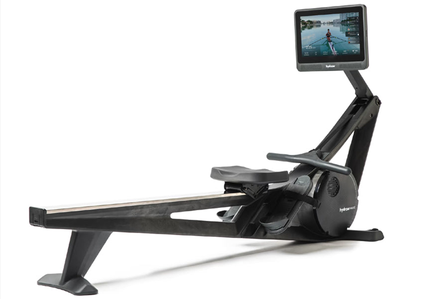 Black Hydrow Wave rowing machine with digital touchscreen monitor displaying water rowing simulation, on white background